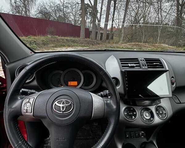 Червоний Тойота РАВ 4, об'ємом двигуна 2 л та пробігом 131 тис. км за 12999 $, фото 6 на Automoto.ua