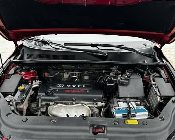 Червоний Тойота РАВ 4, об'ємом двигуна 2 л та пробігом 131 тис. км за 12999 $, фото 15 на Automoto.ua