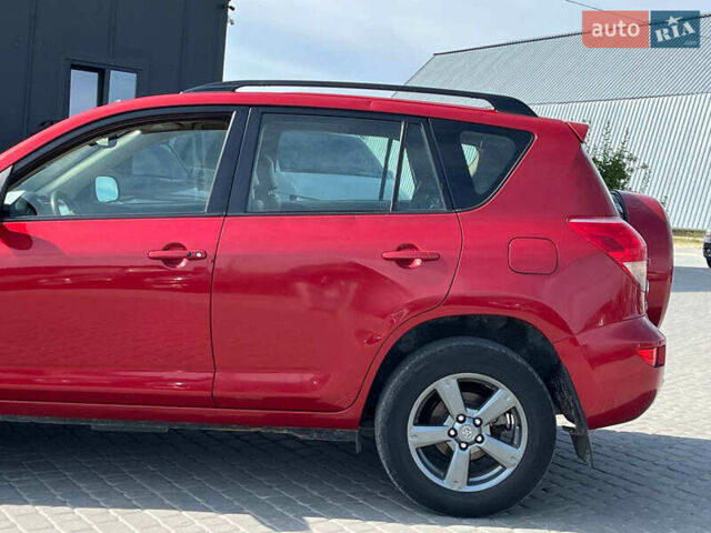 Красный Тойота РАВ 4, объемом двигателя 2 л и пробегом 278 тыс. км за 8990 $, фото 5 на Automoto.ua