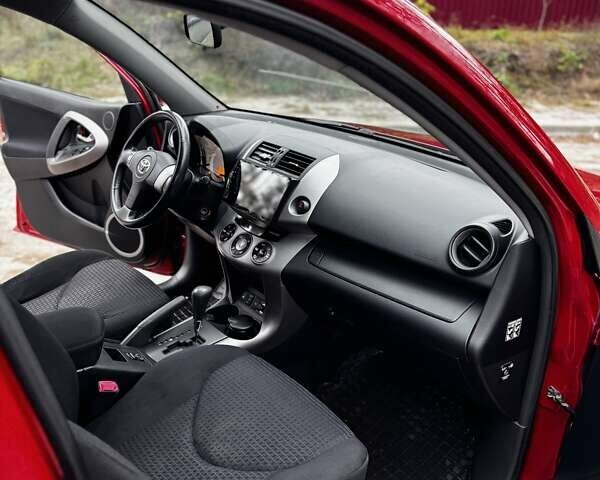 Червоний Тойота РАВ 4, об'ємом двигуна 2 л та пробігом 131 тис. км за 12999 $, фото 4 на Automoto.ua