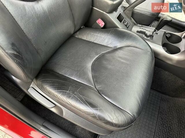 Красный Тойота РАВ 4, объемом двигателя 2.36 л и пробегом 200 тыс. км за 9999 $, фото 90 на Automoto.ua