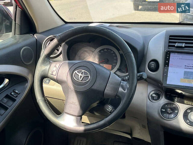 Красный Тойота РАВ 4, объемом двигателя 2 л и пробегом 278 тыс. км за 8990 $, фото 24 на Automoto.ua