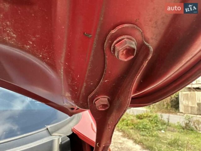 Красный Тойота РАВ 4, объемом двигателя 2.36 л и пробегом 200 тыс. км за 9999 $, фото 112 на Automoto.ua