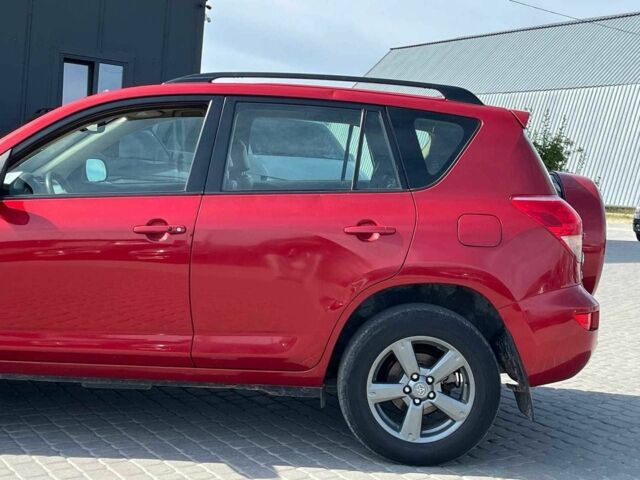 Красный Тойота РАВ 4, объемом двигателя 2 л и пробегом 278 тыс. км за 6990 $, фото 5 на Automoto.ua