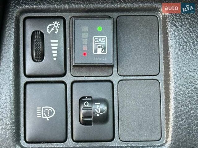 Красный Тойота РАВ 4, объемом двигателя 2 л и пробегом 174 тыс. км за 10999 $, фото 43 на Automoto.ua