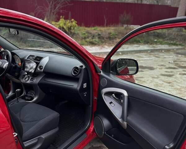 Червоний Тойота РАВ 4, об'ємом двигуна 2 л та пробігом 131 тис. км за 12999 $, фото 12 на Automoto.ua