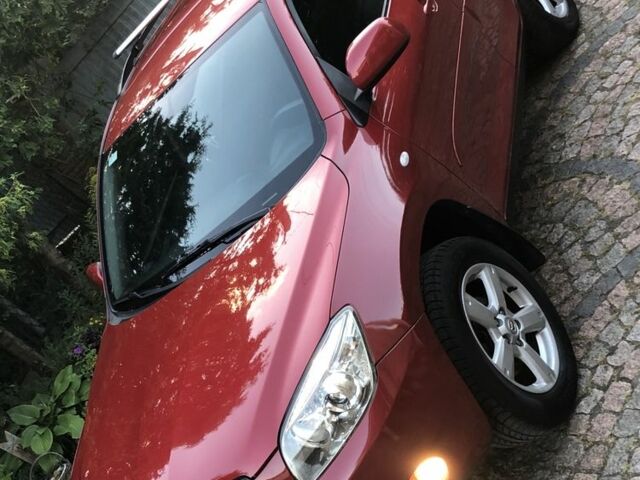 Красный Тойота РАВ 4, объемом двигателя 2 л и пробегом 232 тыс. км за 8999 $, фото 2 на Automoto.ua