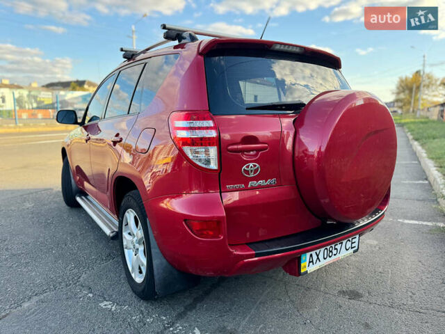 Красный Тойота РАВ 4, объемом двигателя 2 л и пробегом 164 тыс. км за 12300 $, фото 1 на Automoto.ua