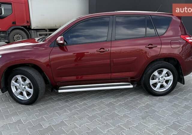 Красный Тойота РАВ 4, объемом двигателя 2 л и пробегом 137 тыс. км за 13699 $, фото 4 на Automoto.ua