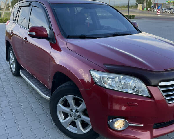 Червоний Тойота РАВ 4, об'ємом двигуна 1.99 л та пробігом 220 тис. км за 11500 $, фото 6 на Automoto.ua