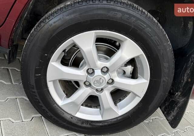 Красный Тойота РАВ 4, объемом двигателя 2 л и пробегом 137 тыс. км за 13699 $, фото 14 на Automoto.ua