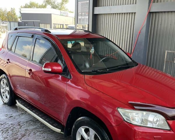 Червоний Тойота РАВ 4, об'ємом двигуна 1.99 л та пробігом 220 тис. км за 11500 $, фото 4 на Automoto.ua