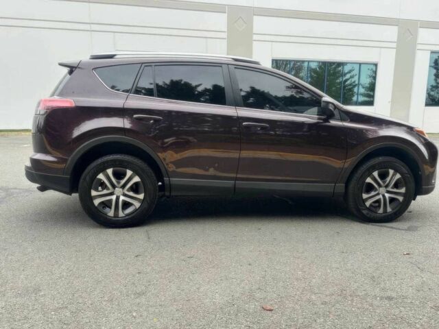 Красный Тойота РАВ 4, объемом двигателя 2.5 л и пробегом 77 тыс. км за 14600 $, фото 3 на Automoto.ua