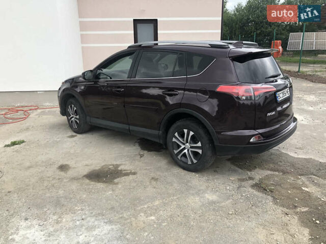 Красный Тойота РАВ 4, объемом двигателя 2.49 л и пробегом 98 тыс. км за 17400 $, фото 4 на Automoto.ua