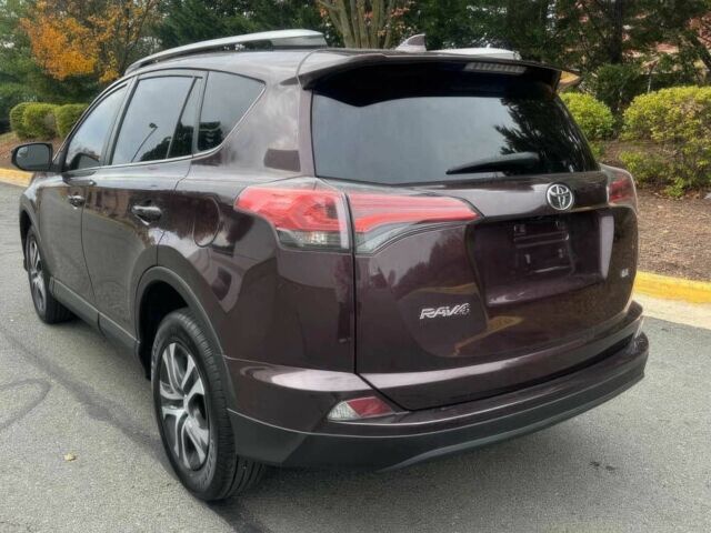 Красный Тойота РАВ 4, объемом двигателя 2.5 л и пробегом 77 тыс. км за 14600 $, фото 5 на Automoto.ua