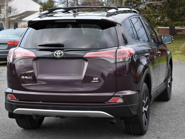 Червоний Тойота РАВ 4, об'ємом двигуна 2.5 л та пробігом 78 тис. км за 7200 $, фото 4 на Automoto.ua