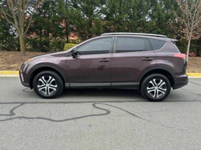 Красный Тойота РАВ 4, объемом двигателя 2.5 л и пробегом 77 тыс. км за 14600 $, фото 4 на Automoto.ua