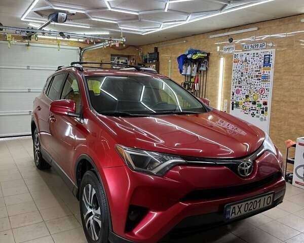 Червоний Тойота РАВ 4, об'ємом двигуна 2.49 л та пробігом 90 тис. км за 18500 $, фото 1 на Automoto.ua
