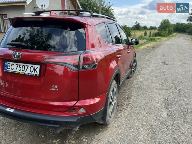 Червоний Тойота РАВ 4, об'ємом двигуна 2.4 л та пробігом 82 тис. км за 18000 $, фото 5 на Automoto.ua