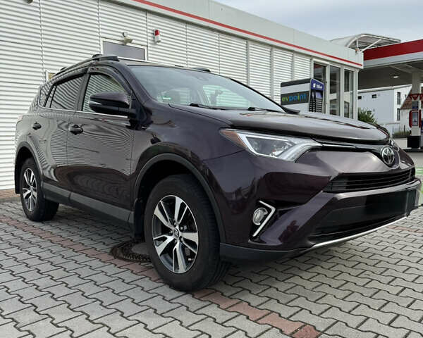 Червоний Тойота РАВ 4, об'ємом двигуна 2.49 л та пробігом 157 тис. км за 21200 $, фото 2 на Automoto.ua