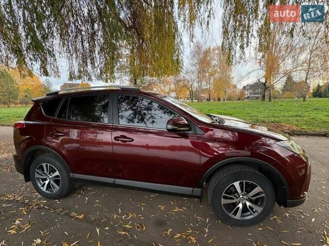 Красный Тойота РАВ 4, объемом двигателя 1.99 л и пробегом 218 тыс. км за 19300 $, фото 3 на Automoto.ua