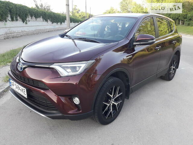 Червоний Тойота РАВ 4, об'ємом двигуна 2.49 л та пробігом 110 тис. км за 23700 $, фото 1 на Automoto.ua