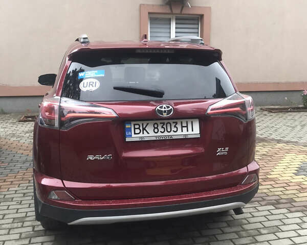 Красный Тойота РАВ 4, объемом двигателя 2.5 л и пробегом 128 тыс. км за 28000 $, фото 1 на Automoto.ua