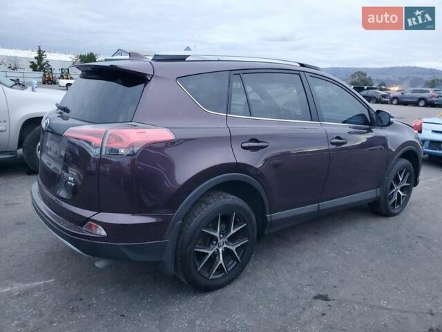 Красный Тойота РАВ 4, объемом двигателя 2.49 л и пробегом 147 тыс. км за 5400 $, фото 2 на Automoto.ua