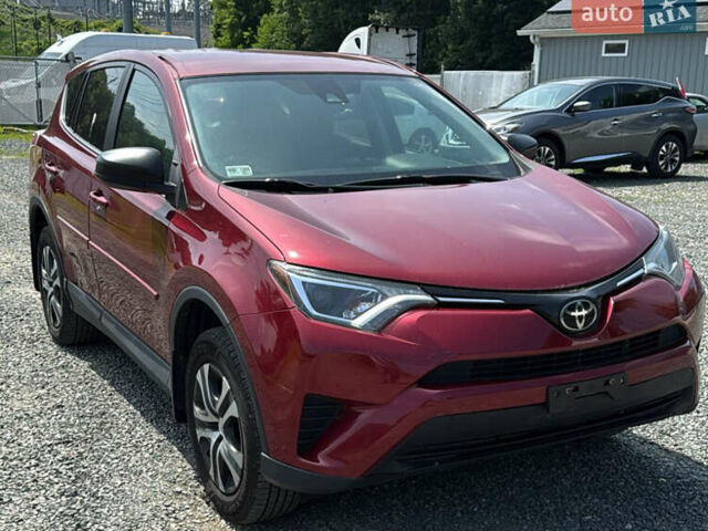Червоний Тойота РАВ 4, об'ємом двигуна 2.49 л та пробігом 225 тис. км за 9600 $, фото 1 на Automoto.ua