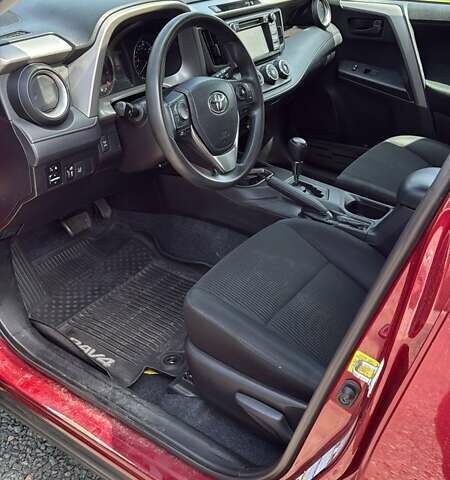 Червоний Тойота РАВ 4, об'ємом двигуна 2.49 л та пробігом 225 тис. км за 9600 $, фото 3 на Automoto.ua