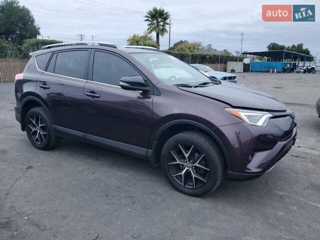 Красный Тойота РАВ 4, объемом двигателя 2.49 л и пробегом 147 тыс. км за 5400 $, фото 3 на Automoto.ua