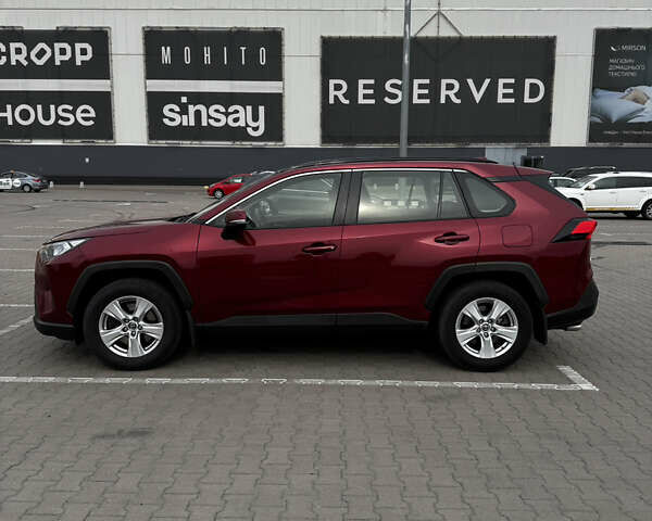 Красный Тойота РАВ 4, объемом двигателя 1.99 л и пробегом 138 тыс. км за 24400 $, фото 3 на Automoto.ua