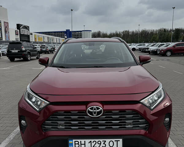 Красный Тойота РАВ 4, объемом двигателя 1.99 л и пробегом 138 тыс. км за 24400 $, фото 1 на Automoto.ua