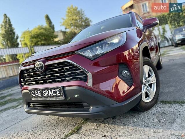 Червоний Тойота РАВ 4, об'ємом двигуна 2.49 л та пробігом 130 тис. км за 21799 $, фото 2 на Automoto.ua