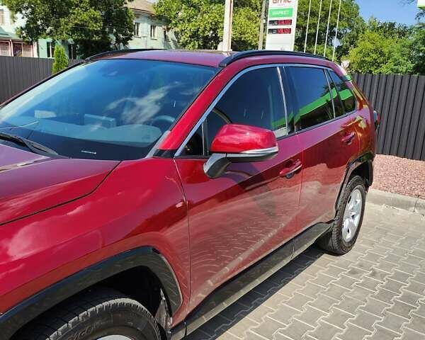 Червоний Тойота РАВ 4, об'ємом двигуна 2.49 л та пробігом 66 тис. км за 27500 $, фото 2 на Automoto.ua