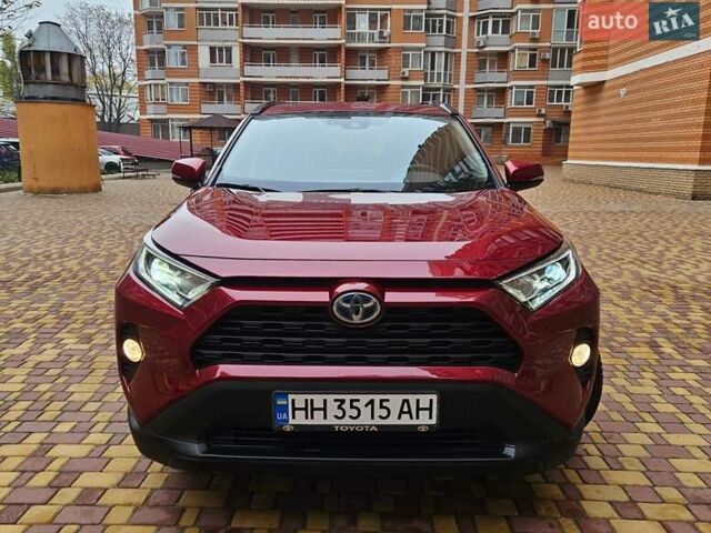 Червоний Тойота РАВ 4, об'ємом двигуна 2.49 л та пробігом 92 тис. км за 30800 $, фото 1 на Automoto.ua