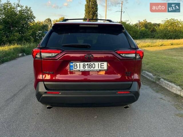 Красный Тойота РАВ 4, объемом двигателя 2.49 л и пробегом 43 тыс. км за 30000 $, фото 2 на Automoto.ua