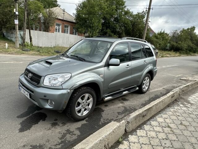 Серый Тойота РАВ 4, объемом двигателя 2 л и пробегом 320 тыс. км за 4000 $, фото 2 на Automoto.ua