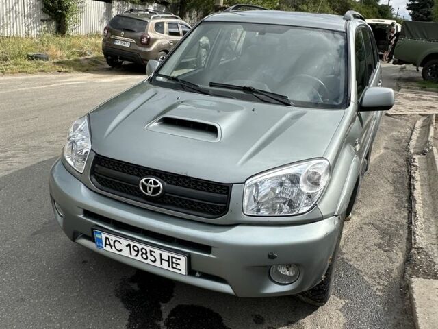 Серый Тойота РАВ 4, объемом двигателя 2 л и пробегом 320 тыс. км за 4000 $, фото 4 на Automoto.ua