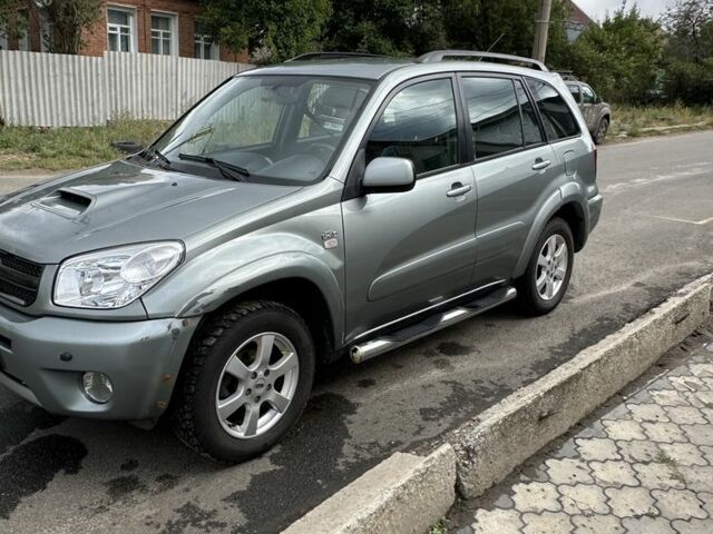 Серый Тойота РАВ 4, объемом двигателя 2 л и пробегом 320 тыс. км за 4000 $, фото 6 на Automoto.ua