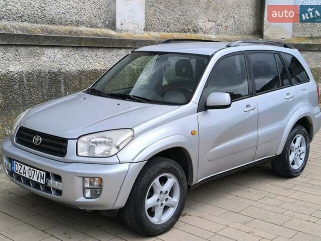 Серый Тойота РАВ 4, объемом двигателя 2 л и пробегом 255 тыс. км за 2150 $, фото 2 на Automoto.ua