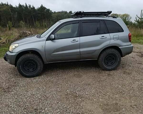 Сірий Тойота РАВ 4, об'ємом двигуна 2.2 л та пробігом 234 тис. км за 2000 $, фото 2 на Automoto.ua