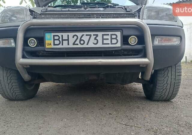 Серый Тойота РАВ 4, объемом двигателя 2 л и пробегом 391 тыс. км за 5250 $, фото 3 на Automoto.ua