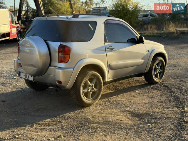 Сірий Тойота РАВ 4, об'ємом двигуна 2 л та пробігом 239 тис. км за 7300 $, фото 37 на Automoto.ua