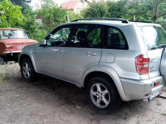 Серый Тойота РАВ 4, объемом двигателя 2 л и пробегом 400 тыс. км за 4500 $, фото 1 на Automoto.ua