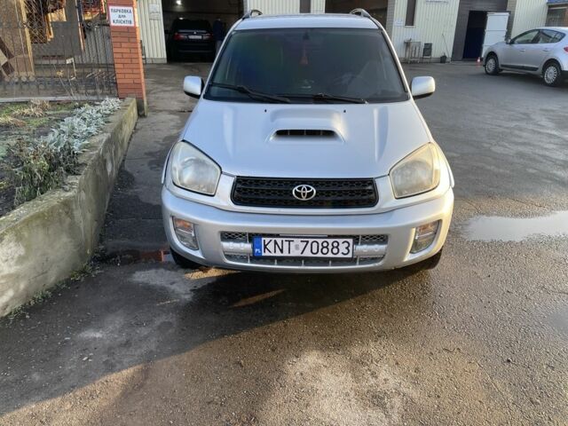 Серый Тойота РАВ 4, объемом двигателя 2 л и пробегом 244 тыс. км за 3650 $, фото 1 на Automoto.ua