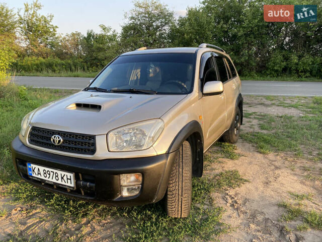 Серый Тойота РАВ 4, объемом двигателя 2 л и пробегом 345 тыс. км за 7800 $, фото 1 на Automoto.ua