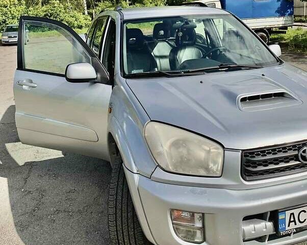 Серый Тойота РАВ 4, объемом двигателя 2 л и пробегом 397 тыс. км за 6800 $, фото 6 на Automoto.ua