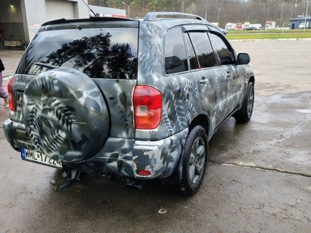 Серый Тойота РАВ 4, объемом двигателя 2 л и пробегом 290 тыс. км за 3050 $, фото 2 на Automoto.ua