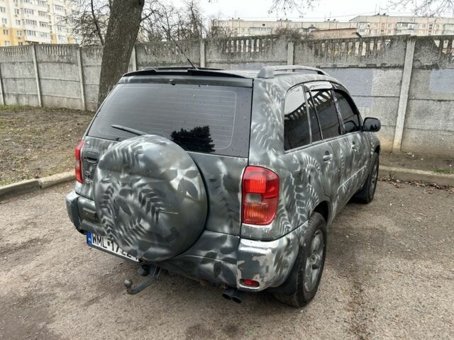 Серый Тойота РАВ 4, объемом двигателя 2 л и пробегом 288 тыс. км за 3400 $, фото 3 на Automoto.ua